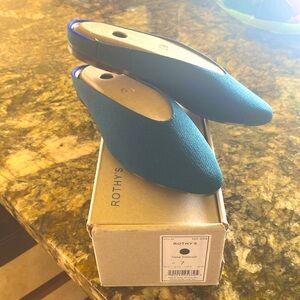 Rothy’s, never worn, Almond Demy in Deep Emerald. Size 7.